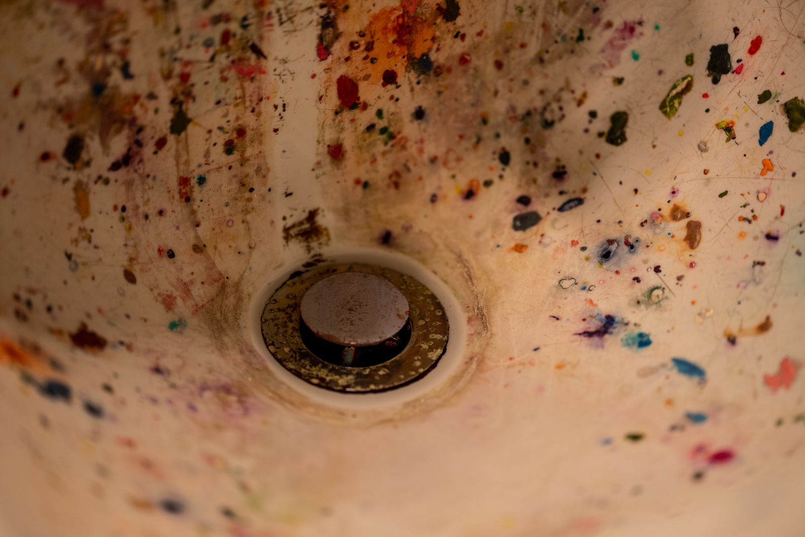 Dirty sink drain residue showing hidden odor buildup pain point