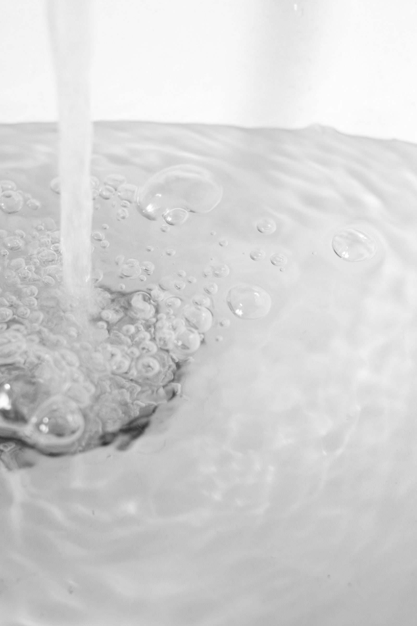 Water bubbling around a drain for odor and residue cleaning tablet use