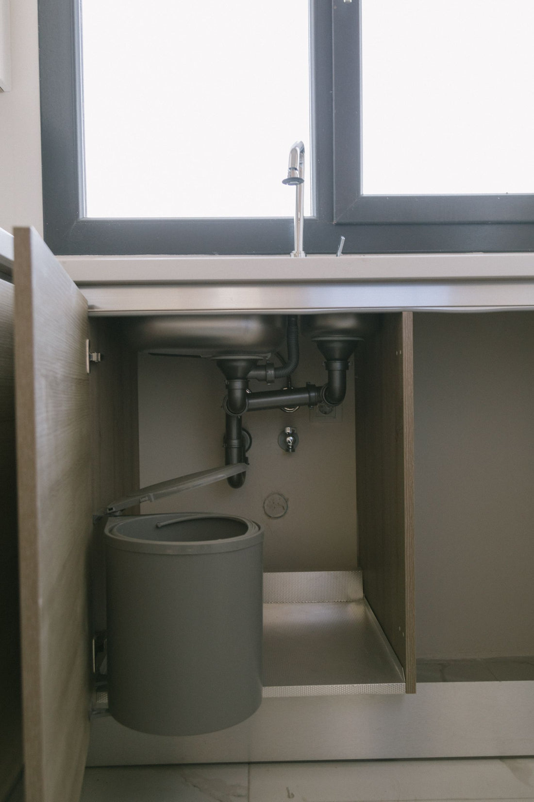 How to Clean Tight Gaps Around Appliances Without Moving Everything