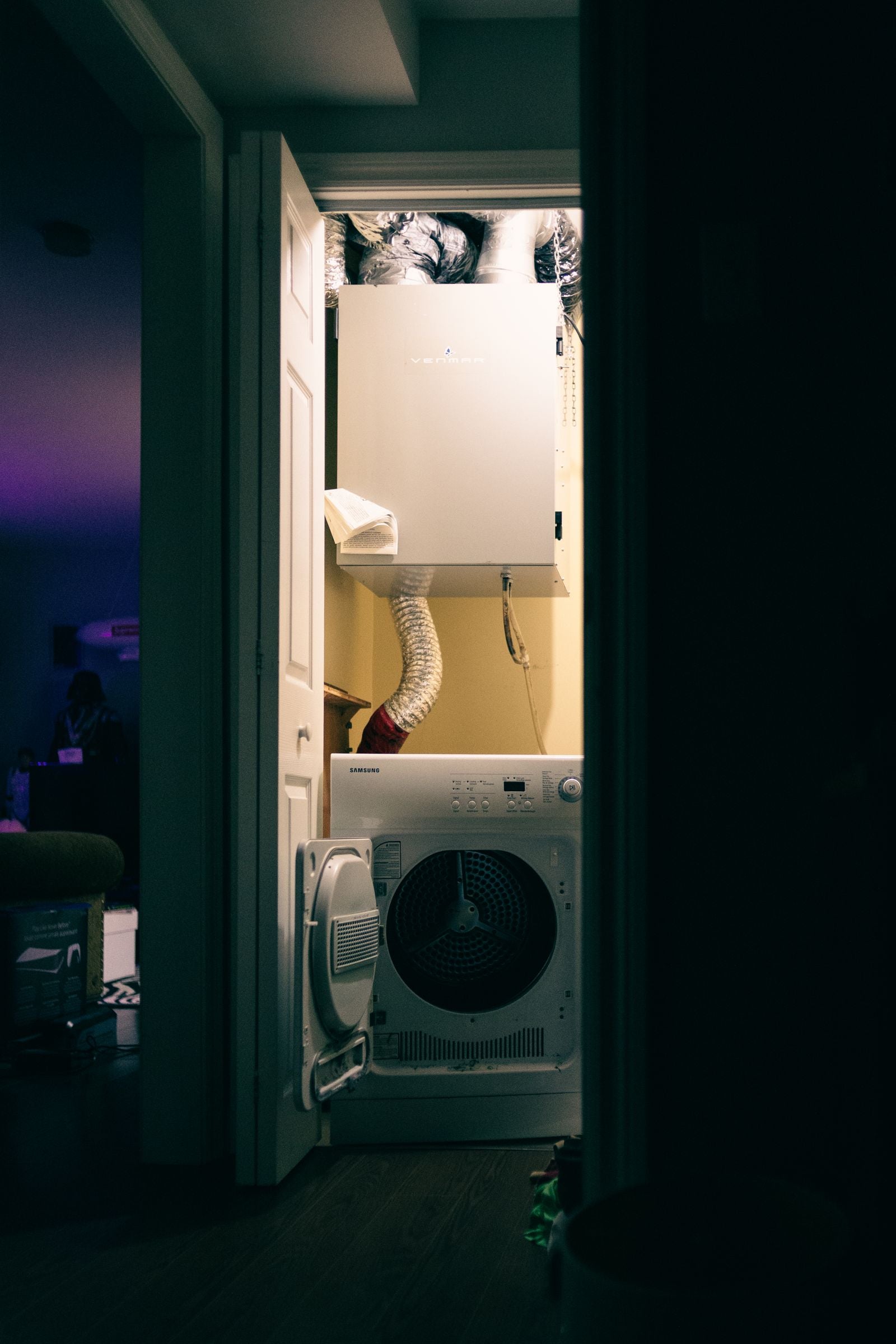 Compact dryer and vent hose setup for practical laundry maintenance schedule